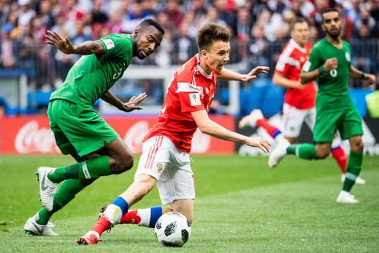 Osama Hawsawi of Saudi Arabia and Aleksandr Golovin of