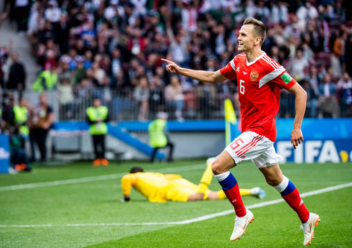 Denis Cheryshev of Russia celebrates