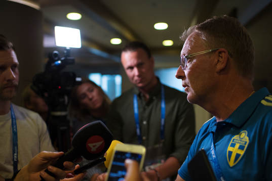Lars Jacobsson is being interviewed by media at a press
