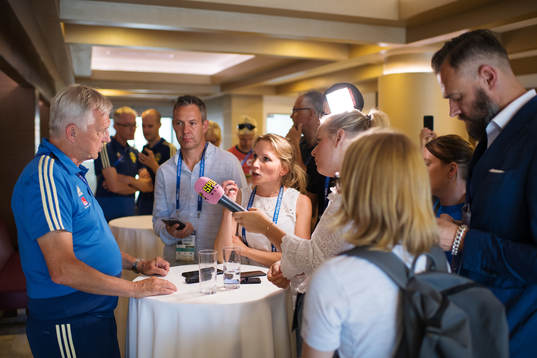 Team Manager Lars Richt is being interviewed by media at a