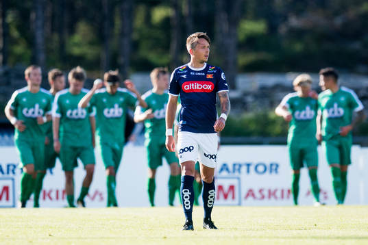 Claes Kronberg of Viking looks dejected while the players