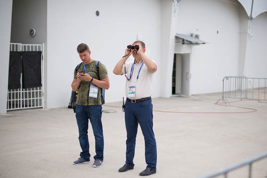 Security agents look for unauthorised spectators when the
