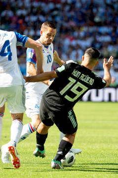 Kari Arnason and Gylfi Sigurdsson of Iceland and Sergio