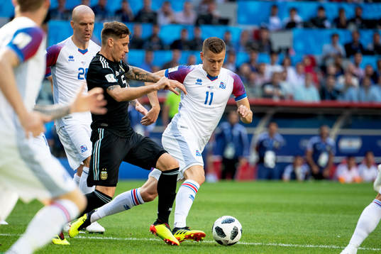 Lucas Biglia of Argentina and Alfred Finnbogason of Iceland
