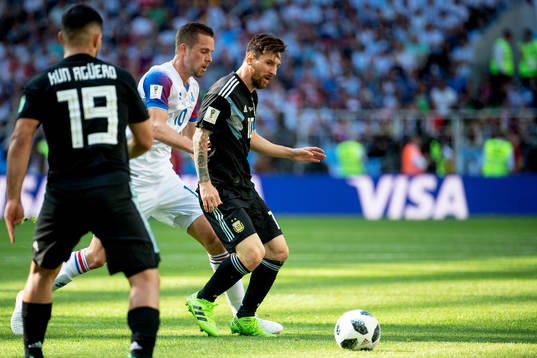 Gylfi Sigurdsson of Iceland and Lionel Messi of Argentina