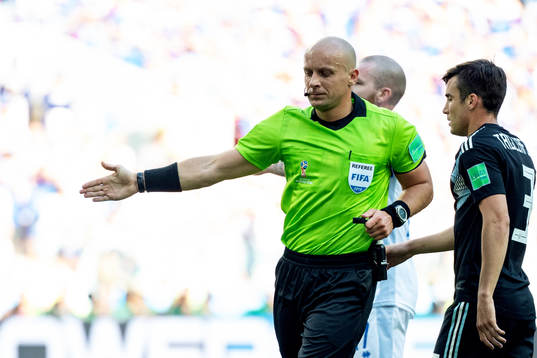 referee Szymon Marciniak a penalty