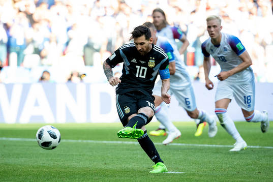 Lionel Messi of Argentina misses a penalty