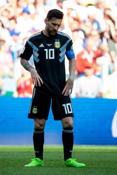 Lionel Messi of Argentina looks dejected