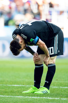Lionel Messi of Argentina looks dejected