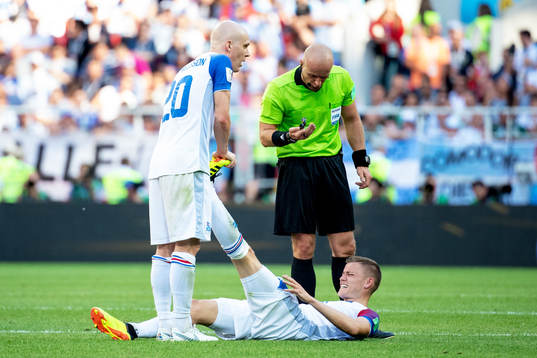 Alfred Finnbogason of Iceland is in pain