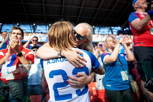 Ari Skulason of Iceland celebrates with his girlfriend