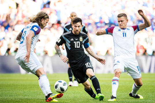 Lionel Messi of Argentina against Birkir Bjarnason and