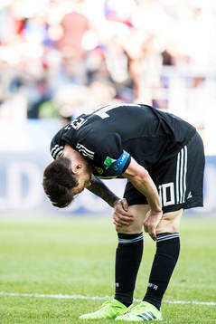 Lionel Messi of Argentina looks dejected