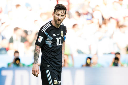 Lionel Messi of Argentina looks dejected