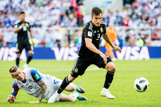 Birkir Saevarsson of Iceland and Nicolas Tagliafico  of