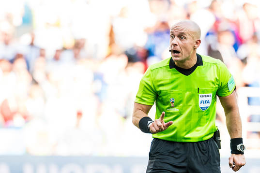Referee Szymon Marciniak
