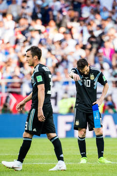 Lionel Messi of Argentina looks dejected