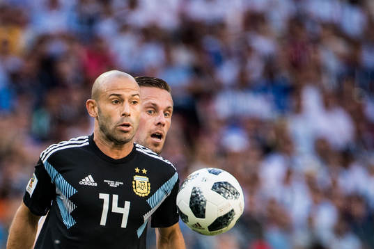 Javier Mascherano of Argentina and Gylfi Sigurdsson of
