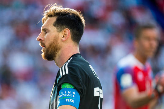 Lionel Messi of Argentina looks dejected