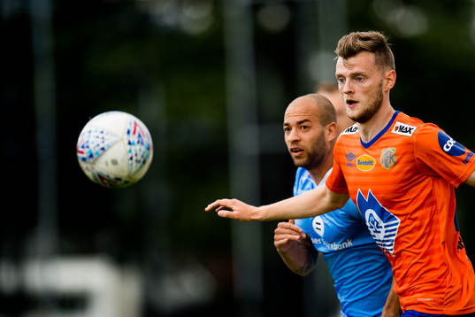 Kristian Brix of Sandnes Ulf  and Adam Örn Arnarson of