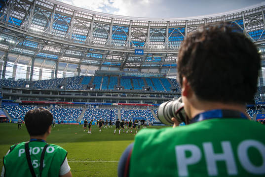 Photographers cover the South Korean national football
