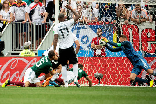goalkeeper Manuel Neuer of Germany saves a shot from Hector