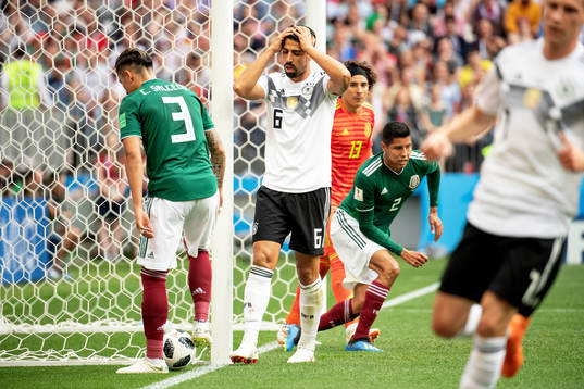 Sami Khedira of Germany looks dejected