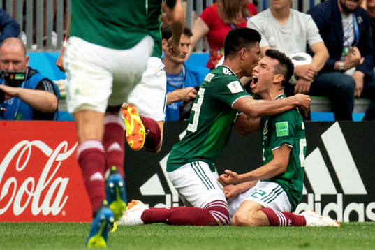 Hirving Lozano of Mexico celebrates with his teammates