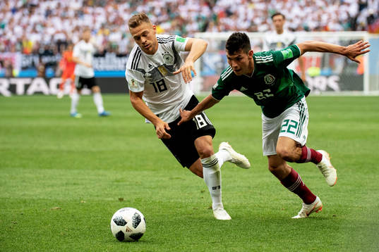 Joshua Kimmich of Germany and Hirving Lozano of Mexico