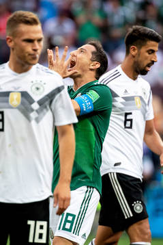 Andres Guardado of Mexico looks dejected