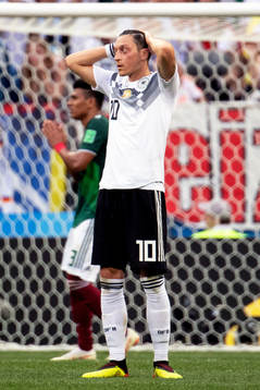 Mesut Özil of Germany looks dejected