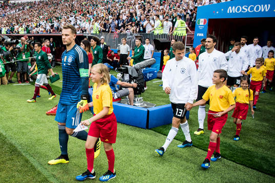 Goalkeeper Manuel Neuer, Thomas Müller and Mats Hummels of