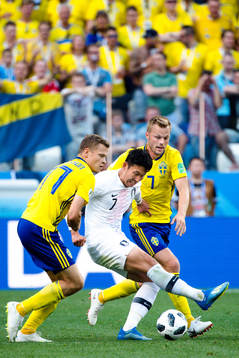 Viktor Claesson and Sebastian Larsson of Sweden against