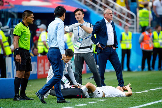 Jooho Park of South Korea with a injury