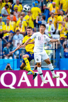 Mikael Lustig of Sweden against Heechan Hwang of South Korea