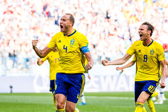Andreas Granqvist and Albin Ekdal of Sweden celebrates the