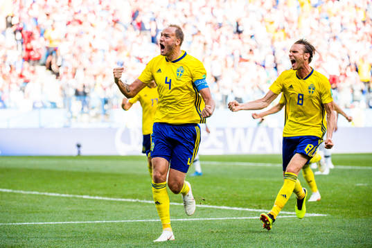 Andreas Granqvist and Albin Ekdal of Sweden celebrates the