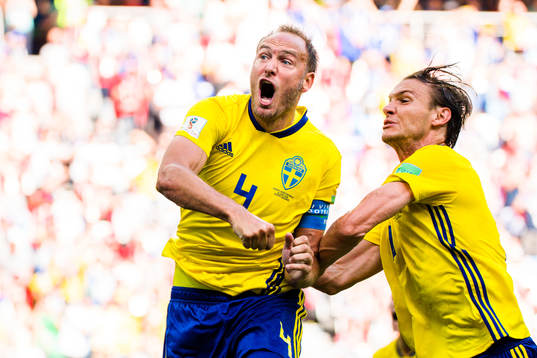 Andreas Granqvist and Albin Ekdal of Sweden celebrates the