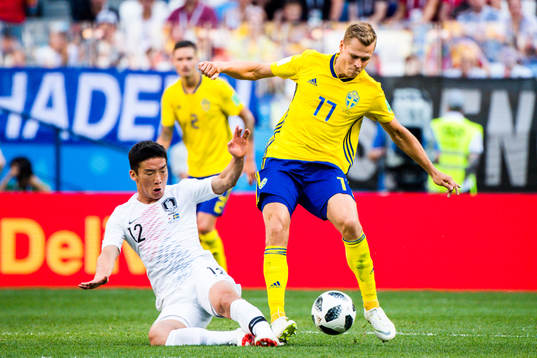 Minwoo Kim of South Korea and Viktor Claesson of Sweden