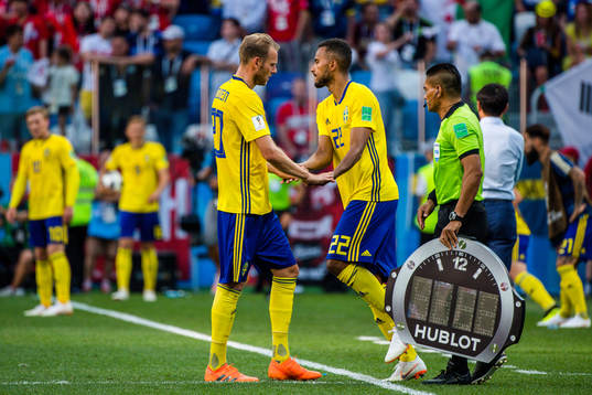 Ola Toivonen and Isaac Kiese Thelin of Sweden
