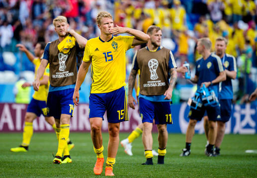 Oscar Hiljemark of Sweden goalkeeper Robin Olsen of Sweden