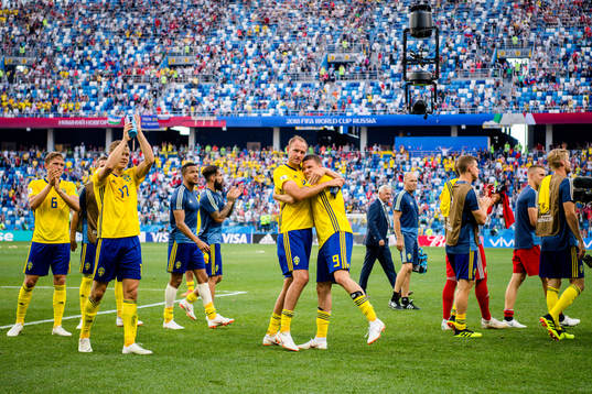 Players of Sweden celebrates