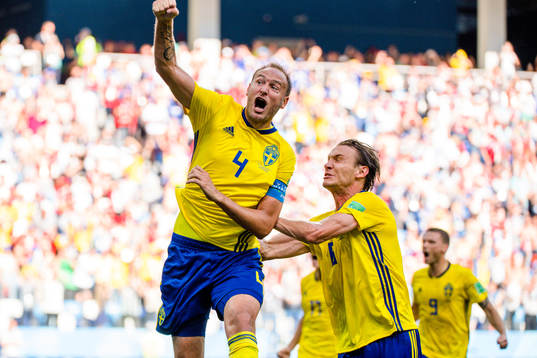Andreas Granqvist and Albin Ekdal of Sweden celebrates the