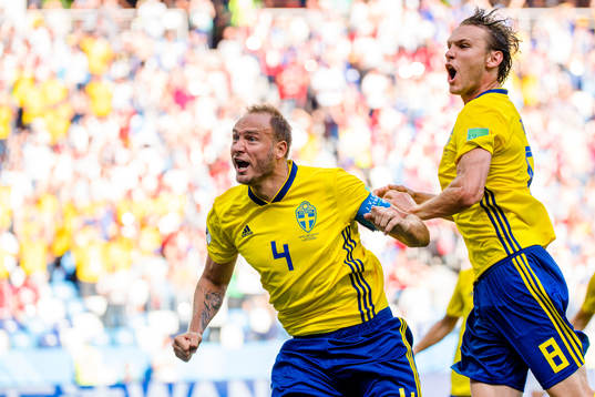Andreas Granqvist and Albin Ekdal of Sweden celebrates the