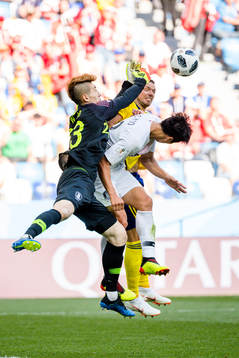 goalkeeper Hyeonwoo Jo and Jacheol Koo of South Korea