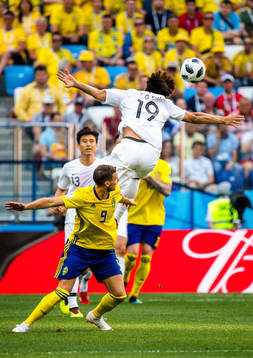 Marcus Berg of Sweden and Younggwon Kim of South Korea