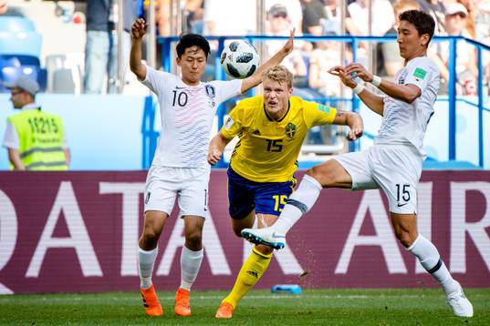 Oscar Hiljemark of Sweden against Seungwoo Lee and Wooyoung