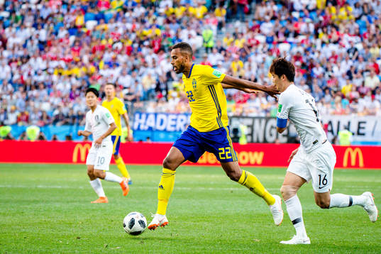 Isaac Kiese Thelin of Sweden and Sungyueng Ki of South Korea