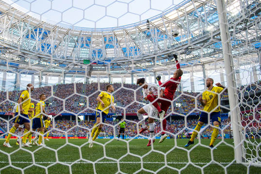 Younggwon Kim of South Korea in action for the ball against