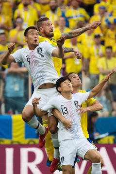 Shinwook Kim and Jacheol Koo of South Korea are being
